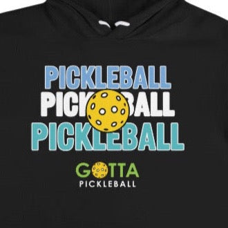 Gotta Pickleball lightweight soft fleece hoodie sweatshirt with centered outlined text of word pickleball listed three times and an image of a pickleball centered on top of text